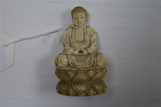 A Japanese ivory figure of a Buddha